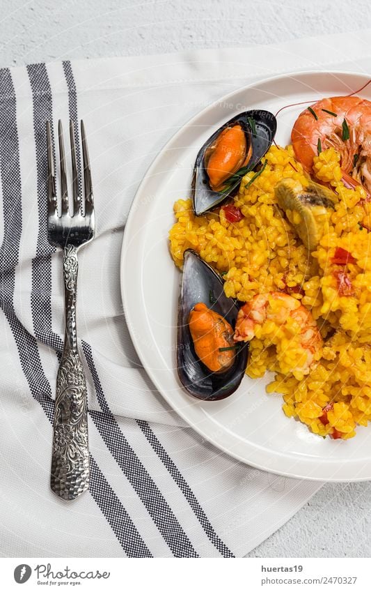Traditional rice in paella with fish and meat Food Meat Seafood Vegetable Diet Plate Healthy Eating Sour Paella Rice Shellfish Chicken stew Spanish