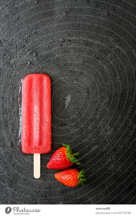 Strawberry popsicle on black stone Food Fruit Ice cream Candy Nutrition Eating Organic produce Fresh Cold Natural Summer Dessert Frozen foods Vegan diet