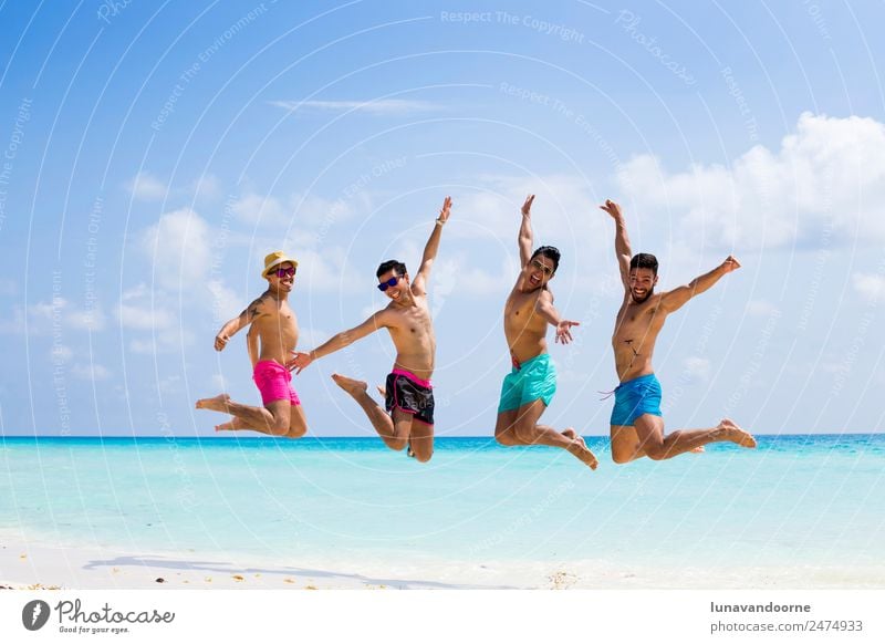 Four gay men jumping at the beach Lifestyle Joy Vacation & Travel Tourism Beach Homosexual Man Adults Friendship Couple 4 Human being 18 - 30 years