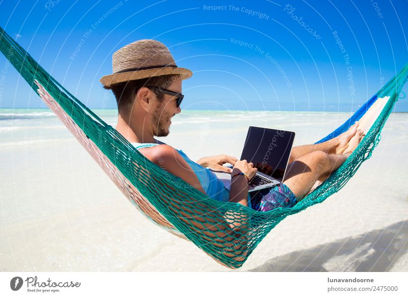 Digital nomad, remote worker with a laptop on a hammock Lifestyle Relaxation Vacation & Travel Summer Beach Work and employment Business Computer Notebook