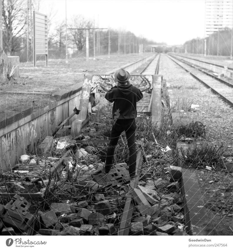 endless. Human being Masculine Young man Youth (Young adults) Man Adults Friendship 1 Deserted Train station Old Dirty Authentic Large Infinity Gloomy