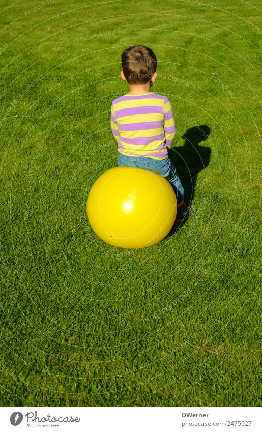 O Lifestyle Leisure and hobbies Playing Vacation & Travel Summer Sun Ball Boy (child) Beautiful weather Grass Meadow T-shirt Jeans Glittering Crouch Jump Yellow