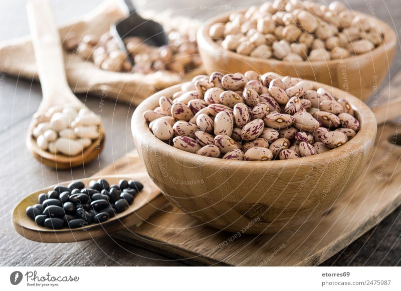 Uncooked assorted legumes in bowls Food Grain Nutrition Eating Organic produce Vegetarian diet Diet Natural Brown Black White Legume Mixed Beans Chickpeas