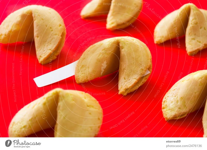 Fortune cookies on red background Food Cake Dessert Nutrition Red Cookie Chinese Communication Sweet Bakery Pattern Art luck Culture Snack Food photograph Text