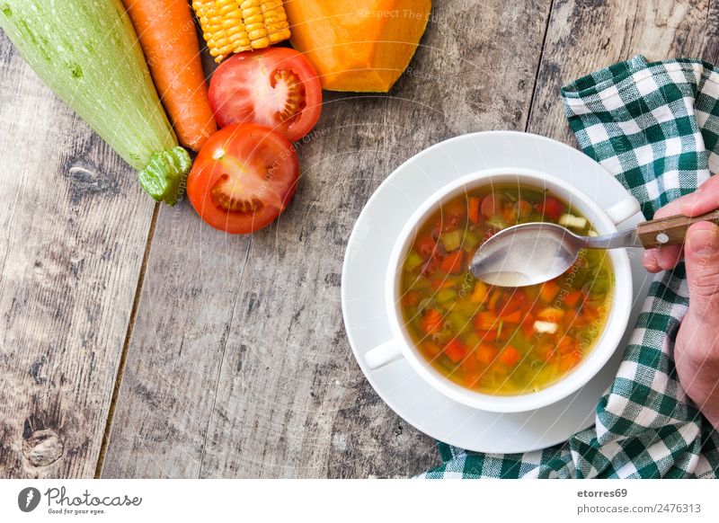 Vegetable soup in bowl on wooden table Food Soup Stew Herbs and spices Nutrition Eating Dinner Organic produce Vegetarian diet Diet Beverage Cold drink Bowl