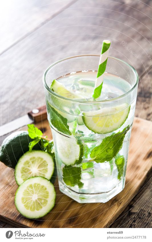 Mojito cocktail Fruit Beverage Alcoholic drinks Spirits Longdrink Cocktail Glass Summer Summer vacation Fresh Cold Sweet Yellow Green Ice Lime Vacation & Travel