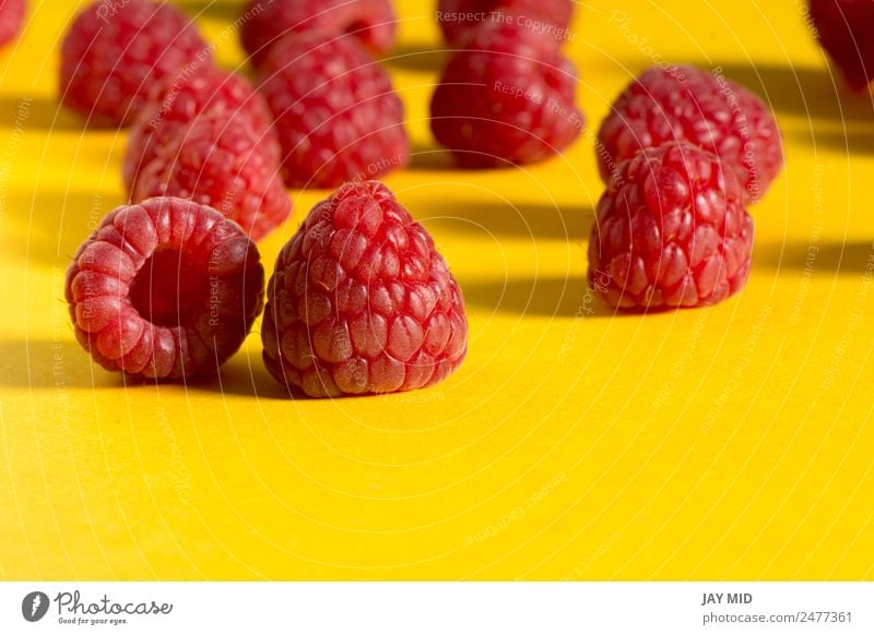 Fresh raspberries on yellow background Food Fruit Dessert Nutrition Organic produce Vegetarian diet Diet Healthy Eating Summer Nature Delicious Natural Juicy