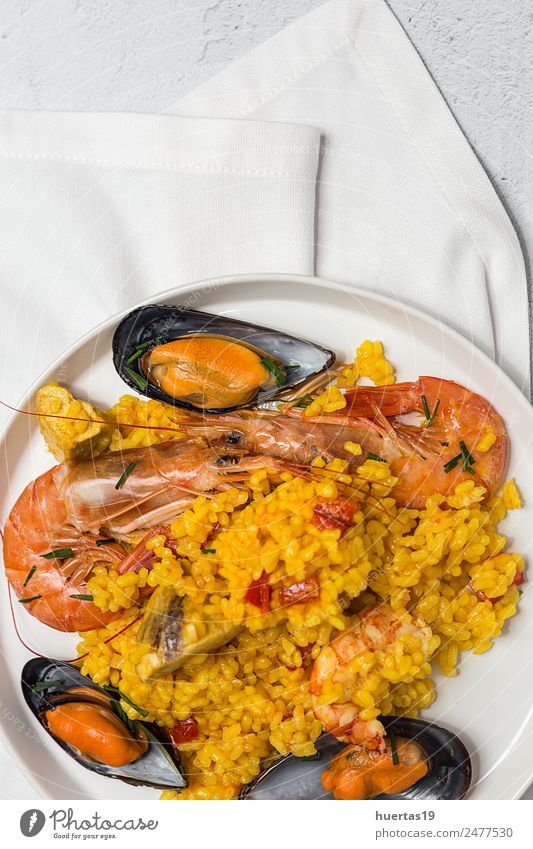 Spanish Traditional rice in paella Food Meat Seafood Vegetable Diet Crockery Plate Healthy Eating Authentic Delicious Sour Paella Rice fish Shellfish Chicken
