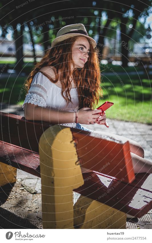 Outdoor portrait of young beautiful happy redhead girl Lifestyle Elegant Style Happy Beautiful Cellphone Human being Feminine Young woman Youth (Young adults)