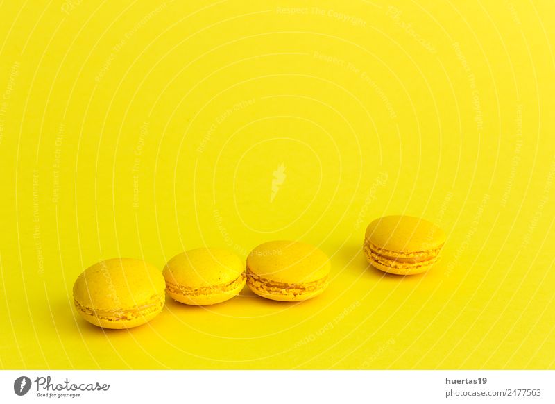 Delicious macaron with yellow background Food Dessert Breakfast Sour Yellow Colour Macaron isolated cake sweet colorful french biscuit Bakery candy snack sugar