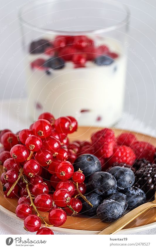 Yogurt with berries, blueberries and raspberries Food Yoghurt Dairy Products Vegetable Fruit Dessert Breakfast Dinner Diet Glass Healthy Newspaper Magazine