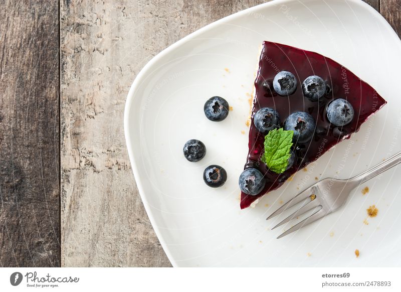 Piece of blueberry cheesecake on wooden table Food Cheese Fruit Cake Dessert Healthy Eating Table Wood Sweet Cheese slice Blueberry Baked goods Candy