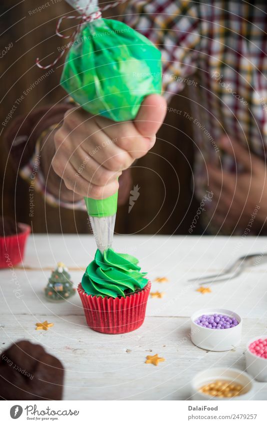 Making cupcake for christmas time Neutral Background Background picture Baking Blur Bright Baked goods Cake Feasts & Celebrations Christmas & Advent Colour