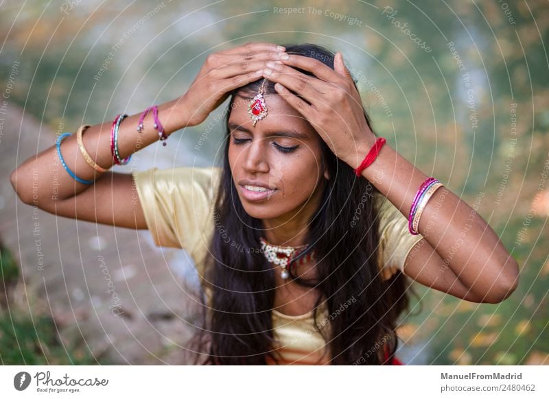 Portrait of a young beautiful traditional indian woman Beautiful Relaxation Calm Human being Feminine Young woman Youth (Young adults) Woman Adults Face Hand 1