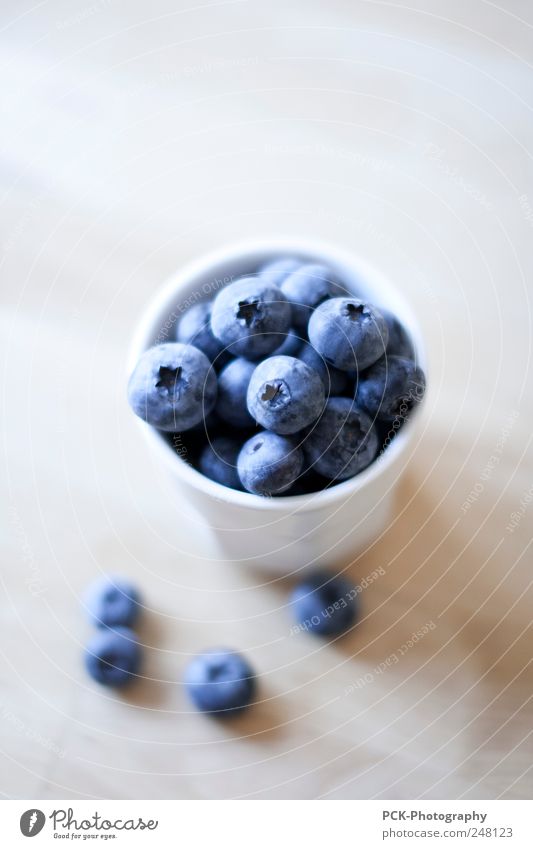 Blueberries in a cup Fruit Dessert Nutrition Vegetarian diet Bowl Cup Mug Lifestyle Style Sustainability blueberry Violet Blur Still Life Colour photo Close-up