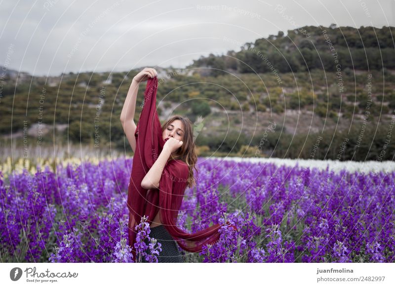 Woman posing in flower field with a handkerchief Lifestyle Happy Beautiful Freedom Summer Garden Human being Adults 18 - 30 years Youth (Young adults) Nature