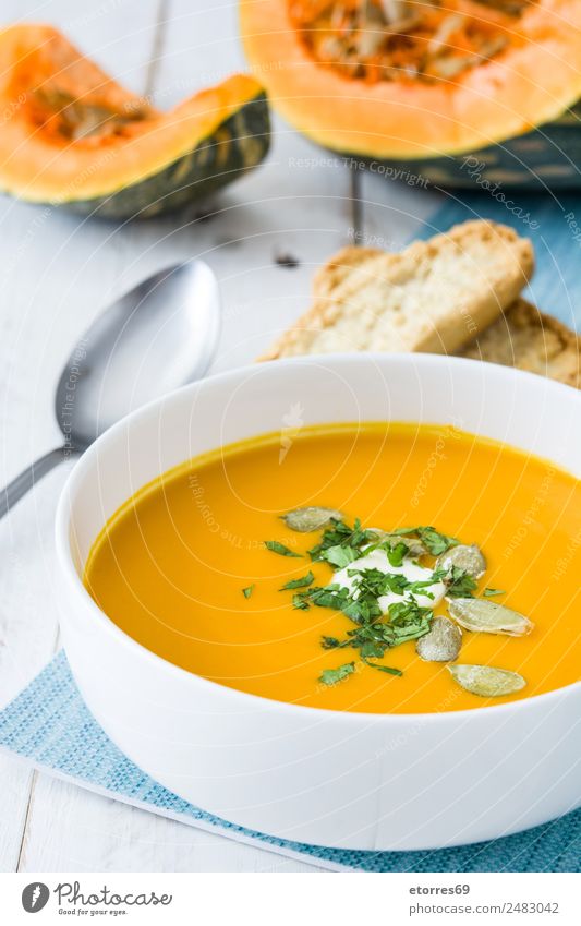 Pumpkin soup Vegetable Bread Soup Stew Nutrition Lunch Dinner Vegetarian diet Diet Bowl Spoon Thanksgiving Good Orange Seed Food Tradition Home-made Tasty