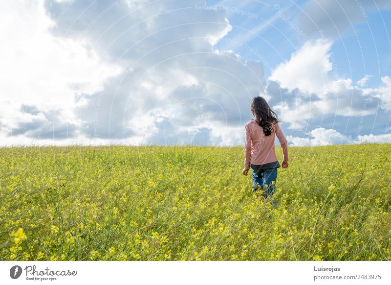 girl walking in a field with yellow flowers sunny day Healthy Allergy Relaxation Freedom Summer Girl 3 - 8 years Child Infancy 8 - 13 years Environment Nature