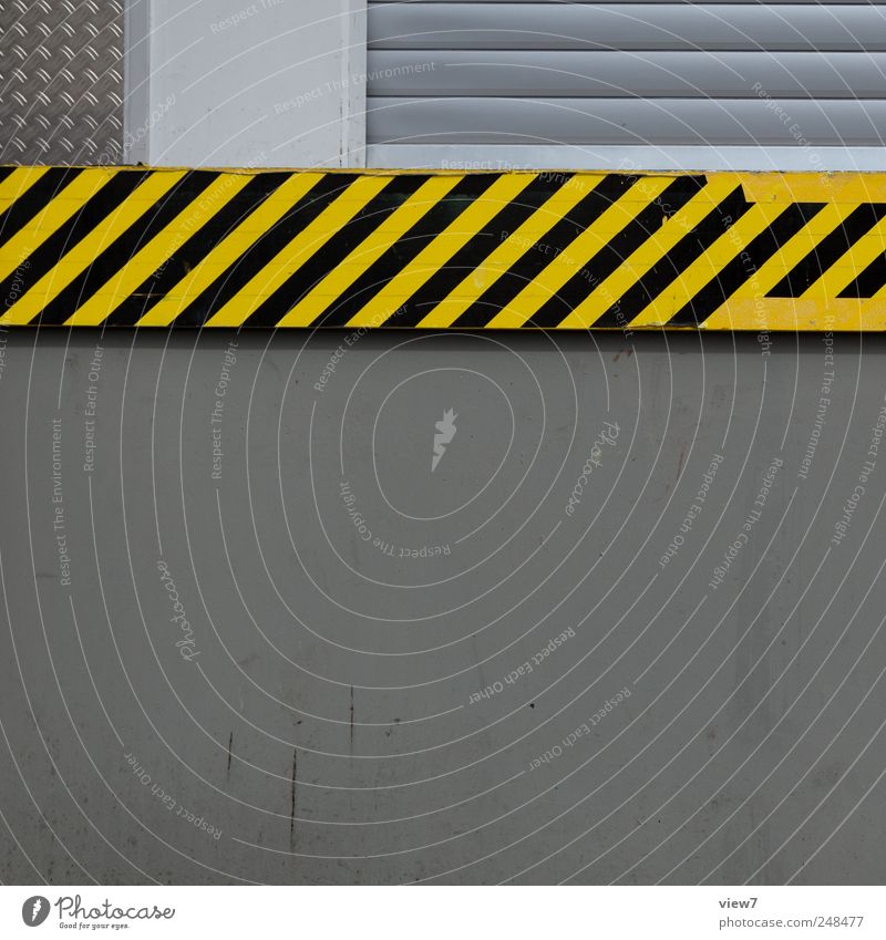 stripes House (Residential Structure) Industrial plant Building Wall (barrier) Wall (building) Facade Stone Concrete Signs and labeling Signage Warning sign