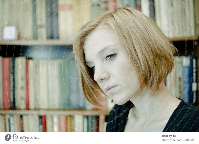 thoughtful. Feminine Young woman Youth (Young adults) Face 1 Human being 18 - 30 years Adults Library Hair and hairstyles Red-haired Short-haired Think Study