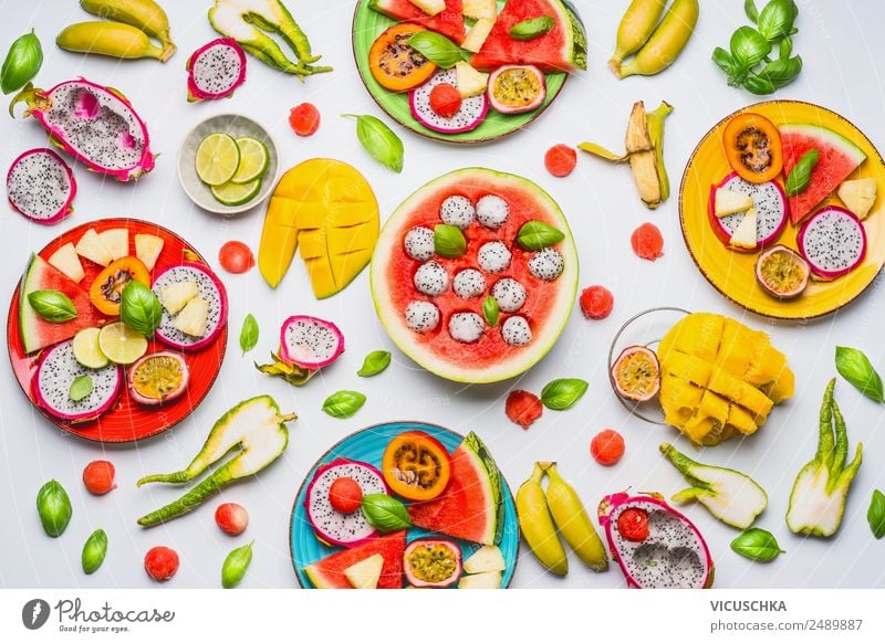 Various tropical fruits and fruits as Bowls Food Lettuce Salad Fruit Orange Nutrition Breakfast Organic produce Vegetarian diet Diet Crockery Plate Lifestyle
