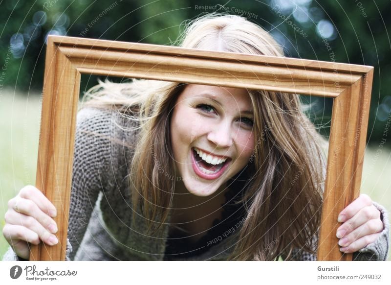 framed. Playing Feminine Young woman Youth (Young adults) Friendship Life Head Face 1 Human being 18 - 30 years Adults Art Picture frame Discover Laughter