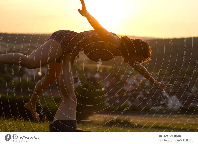 Two sisters doing gymnastics at sunset Lifestyle Joy Happy Healthy Contentment Leisure and hobbies Fitness Sports Training Sailing Human being Feminine