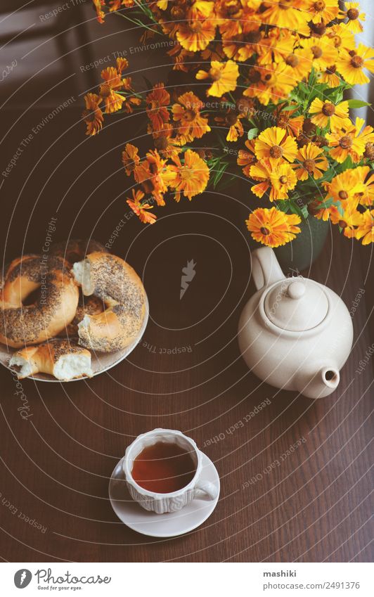 cozy autumn breakfast on table in country house Breakfast Beverage Tea Pot Lifestyle Relaxation Table Autumn Safety (feeling of) fall Bagel eat background calm