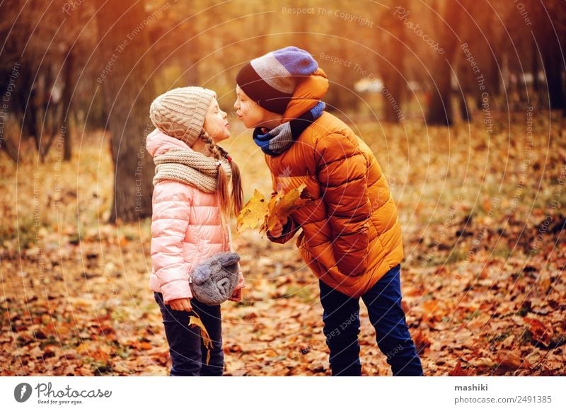 autumn portrait of happy kids playing outdoor in park Joy Leisure and hobbies Playing Vacation & Travel Child Sister Family & Relations Friendship Infancy