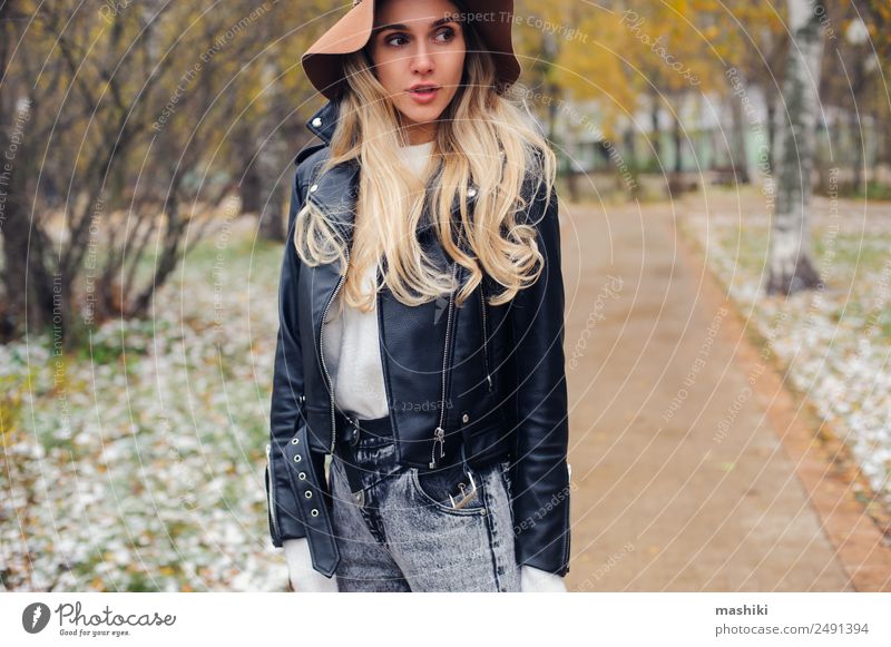 fashion autumn portrait of young happy woman walking outdoor Lifestyle Style Woman Adults Autumn Wind Park Town Fashion Jacket Leather Hat Dream Authentic