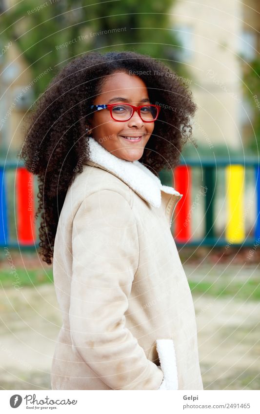 Pretty girl with long afro hair Happy Beautiful Hair and hairstyles Skin Face Child School Woman Adults Sky Warmth Park Coat Afro Cute ten african American