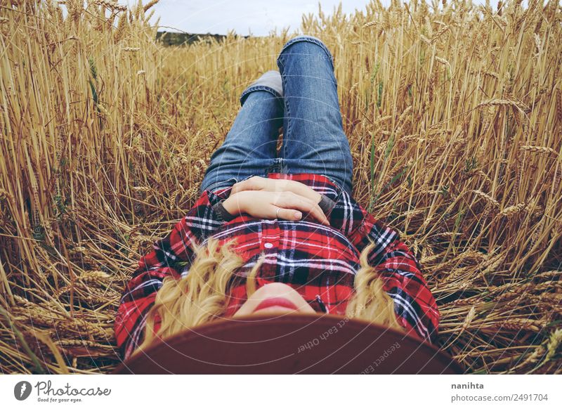 Young woman resting in a field of wheat Lifestyle Wellness Relaxation Summer Summer vacation Agriculture Forestry Human being Feminine Youth (Young adults) 1