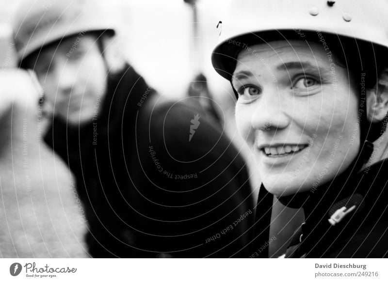 Watching each other Leisure and hobbies Trip Adventure Human being Woman Adults Man 2 30 - 45 years Joy Happiness Authentic Helmet Looking Black & white photo