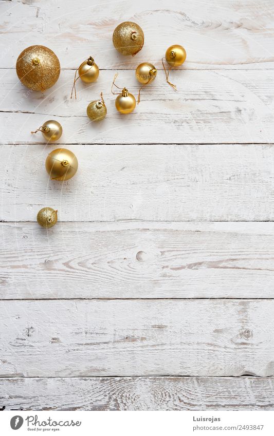rgolden christmas balls on white wood Christmas & Advent Wood Gold Plastic Ornament Friendship Love Goodness Hospitality Altruism Friendliness Colour photo