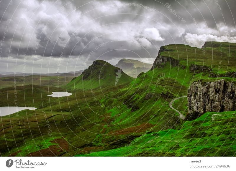 The Quiraing on the Isle of Skye in Scotland Landscape Autumn Climate Climate change Bad weather Rain Meadow Hill Rock Mountain Lake Wet Beautiful Green