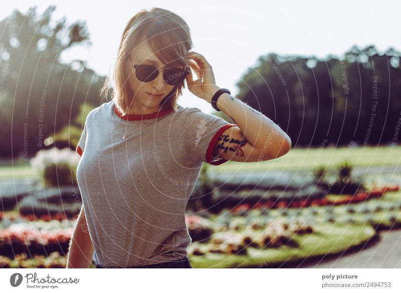 [LS101] - Young woman with sunglasses and tattoo on her arm in the park Lifestyle Style Wellness Human being Feminine Youth (Young adults) Adults Head