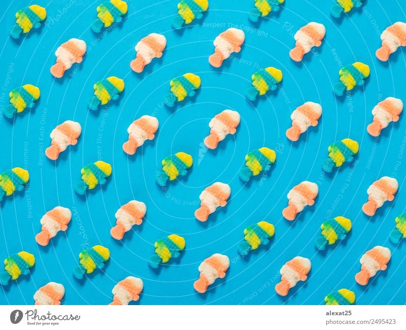 Jelly candies fish pattern on blue background Fruit Dessert Candy Style Design Joy Ocean Art Bright Delicious Blue Yellow Pink Colour colorful Conceptual design