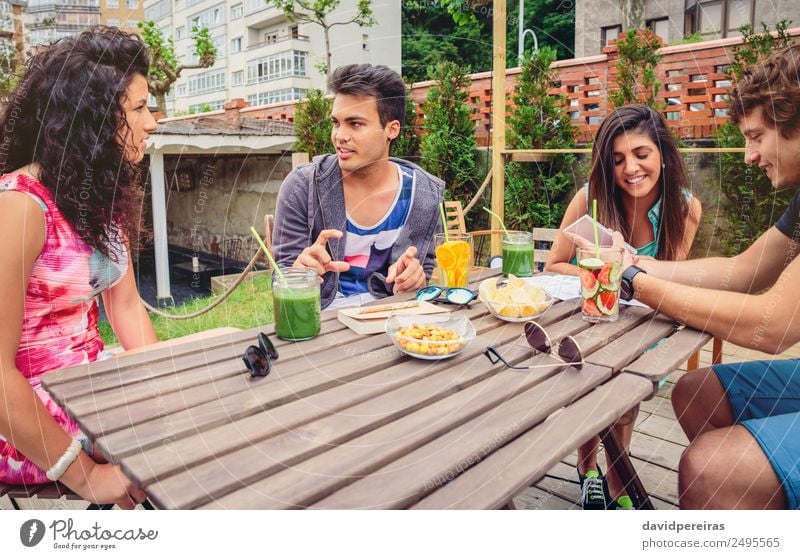 Group of people having fun in a summer day Vegetable Fruit Beverage Lifestyle Joy Happy Beautiful Leisure and hobbies Vacation & Travel Summer Garden Table