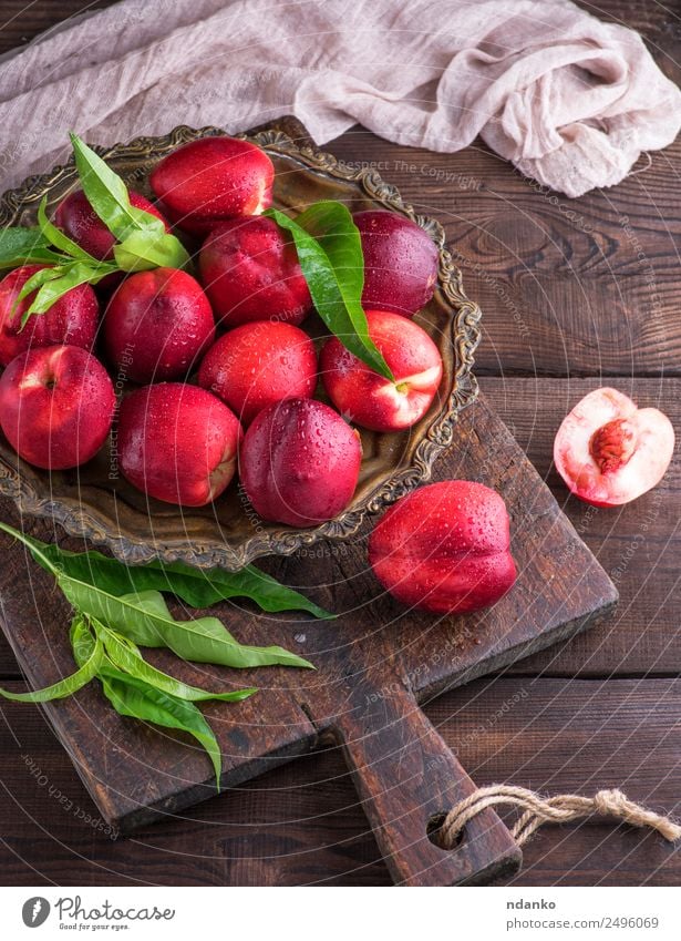 red ripe peaches nectarine Fruit Dessert Nutrition Plate Table Wood Eating Fresh Above Juicy Brown Red Nectarine background food healthy sweet Raw Mature Peach