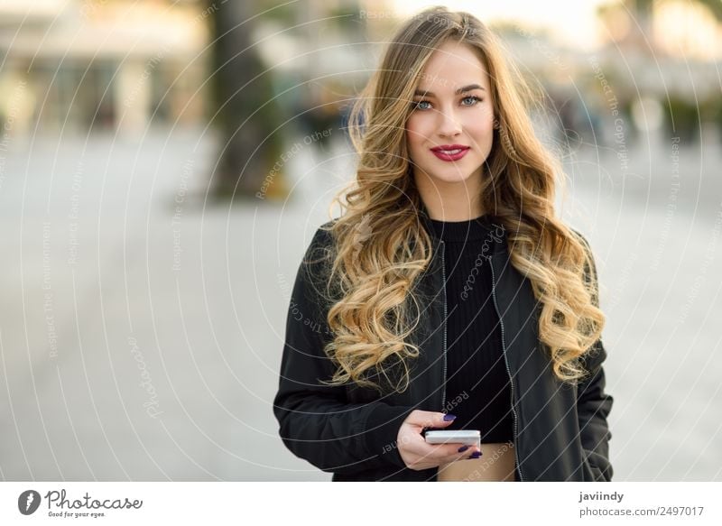 Blonde russian woman in urban background Lifestyle Style Beautiful Hair and hairstyles Telephone Human being Feminine Young woman Youth (Young adults) Woman