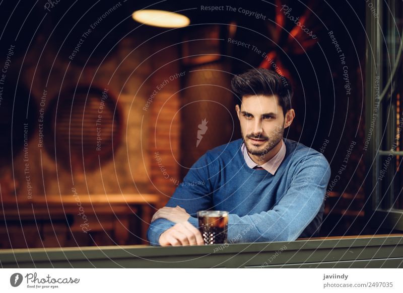 Young man with lost look in a modern pub. Lifestyle Style Happy Beautiful Hair and hairstyles Human being Masculine Youth (Young adults) Man Adults 1
