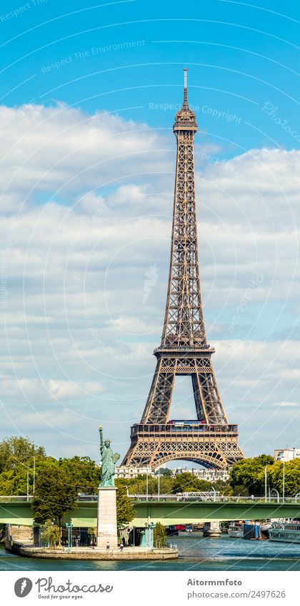 Eiffel Tower and Liberty statue in Paris Vacation & Travel Tourism Sightseeing Island River Skyline Architecture Transport Street Historic Small Modern Green