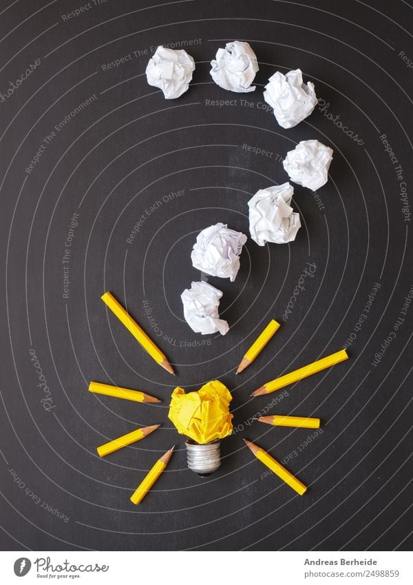 Question mark, paper balls, light bulb with pens Blackboard Business Stationery Paper Piece of paper Pen Characters Yellow Idea Innovative Inspiration