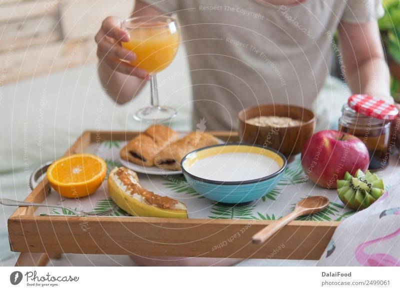 Woman in the breakfast time Apple Banana Bedroom Breakfast Butter Chocolate Coffee Conventional Contain Eating Food Healthy Eating Food photograph Home Hotel