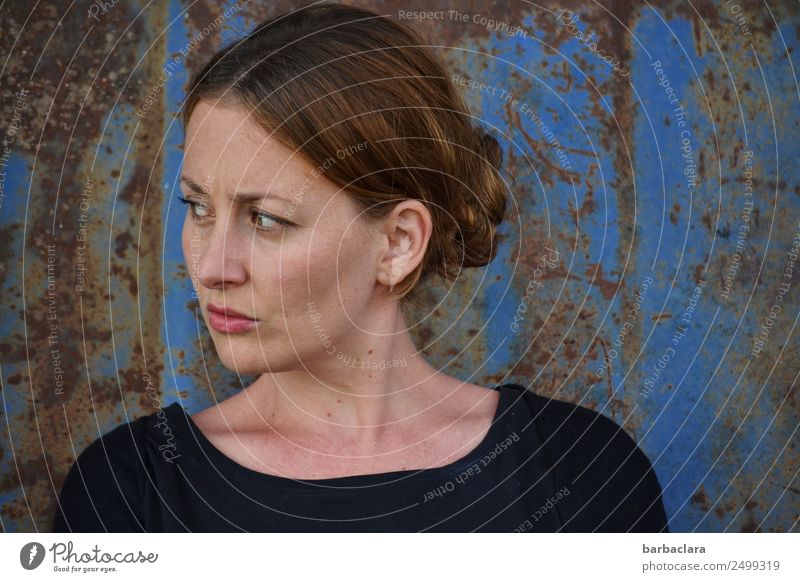 Emotion written all over your face. Feminine Woman Adults 1 Human being Wall (barrier) Wall (building) Facade Metal Rust Looking Stand Blue Emotions