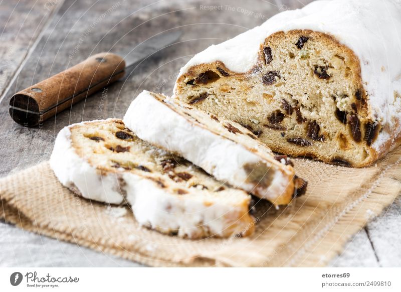 Christmas stollen. Food Fruit Cake Dessert Candy Nutrition Breakfast Lunch Dinner Organic produce Knives Christmas & Advent Wood Good Natural Brown White