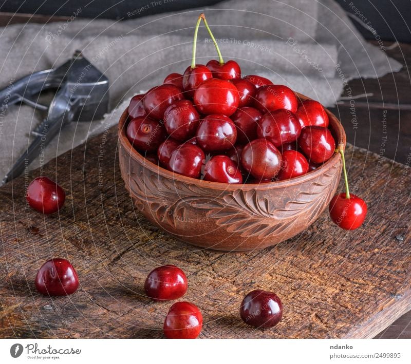 red ripe fresh cherry Fruit Vegetarian diet Bowl Table Nature Wood Eating Fresh Juicy Brown Red Cherry background food healthy sweet Organic Raw Mature Vitamin