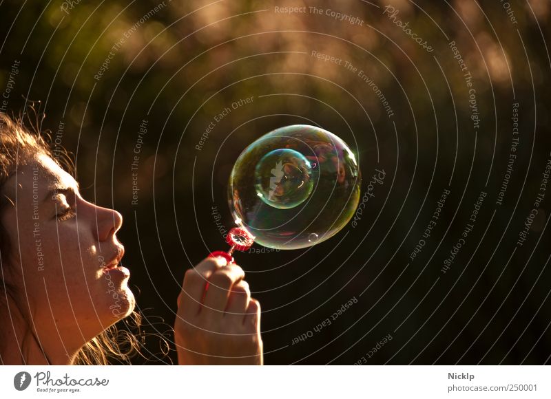 metablase Soap bubble Feminine Young woman Youth (Young adults) Face 18 - 30 years Adults Sunlight Summer Beautiful weather Glittering Joy Happy Enthusiasm