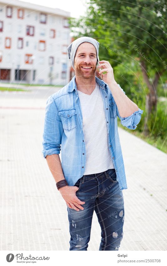 Casual guy Lifestyle Style Joy Happy Leisure and hobbies To talk Telephone PDA Technology Human being Man Adults Street Fashion Shirt Hat Beard Listening