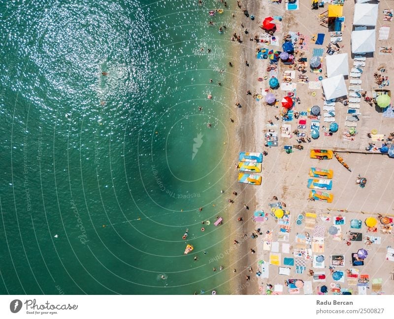 Aerial View From Flying Drone Of People Crowd Relaxing On Beach In Romania At The Black Sea Aircraft Vantage point Sand Background picture Water Above Ocean